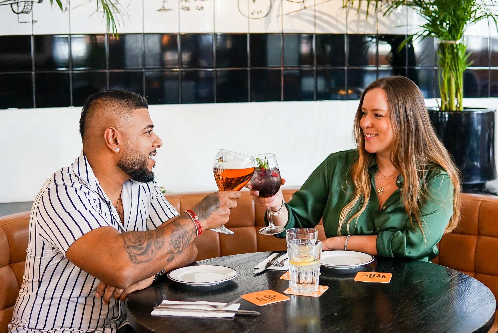 Guests raising a glass at Motor City