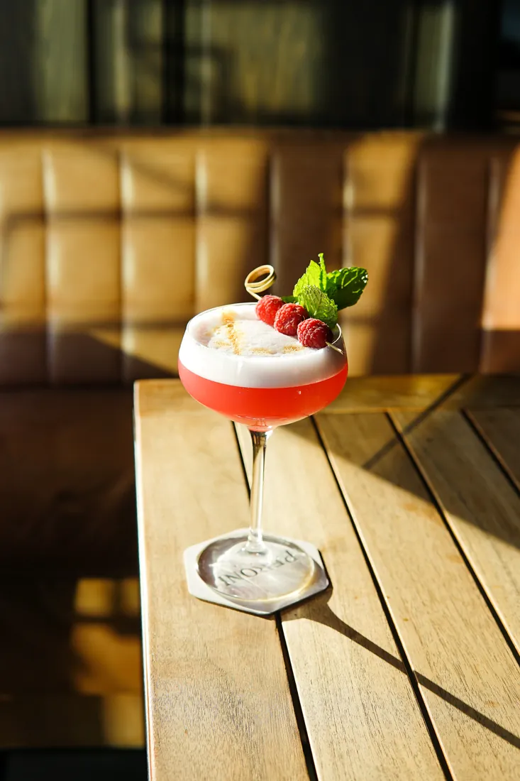 A signature cocktail in the afternoon sun